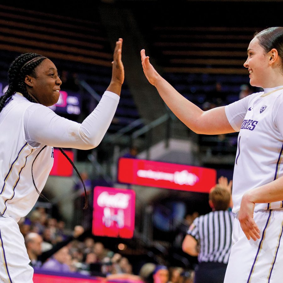 Chantel Osahor and Hannah Johnson high-five.