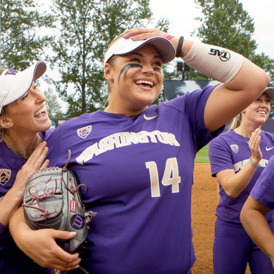 Taran Alvelo with softball teammates