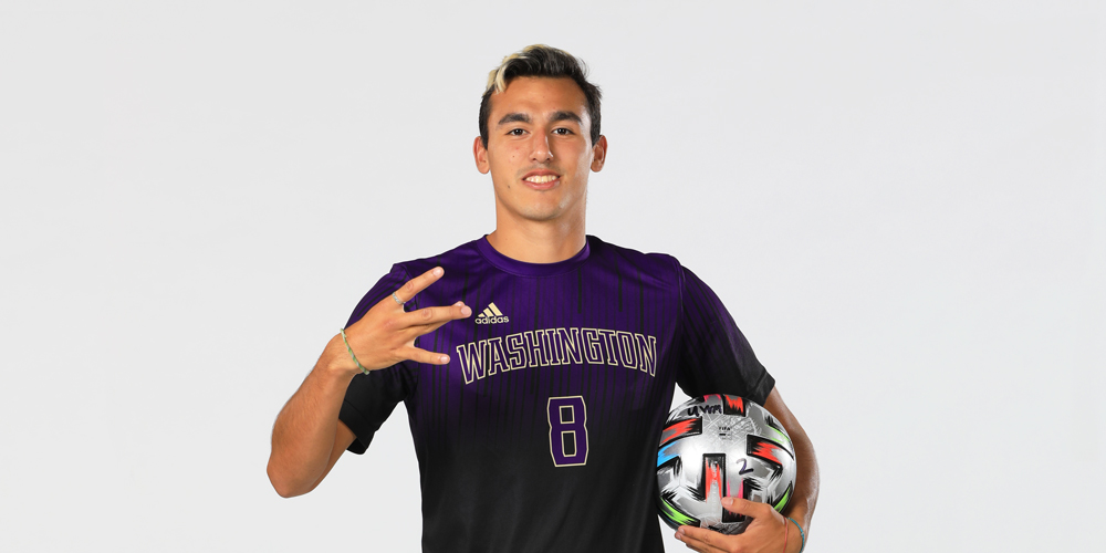 Men's Soccer player Gio Miglietti throws up Dubs