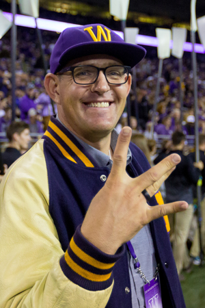 Head Men's Rowing Coach, Michael Callahan, with Dubs up