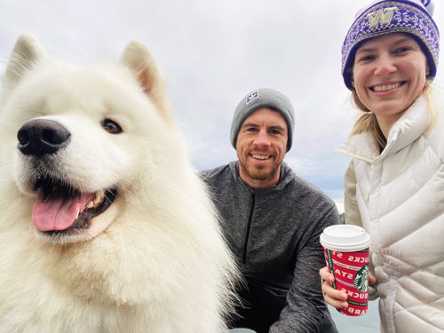 Coach Derek Olson with wife Steph and dog Messi