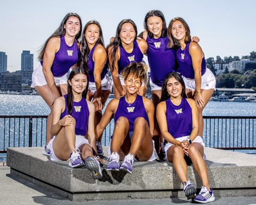 2023 Women's Tennis team poses in front of Seattle waterfront skyline