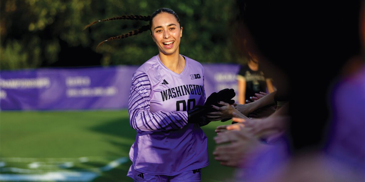 Mia Hamant high-fives team