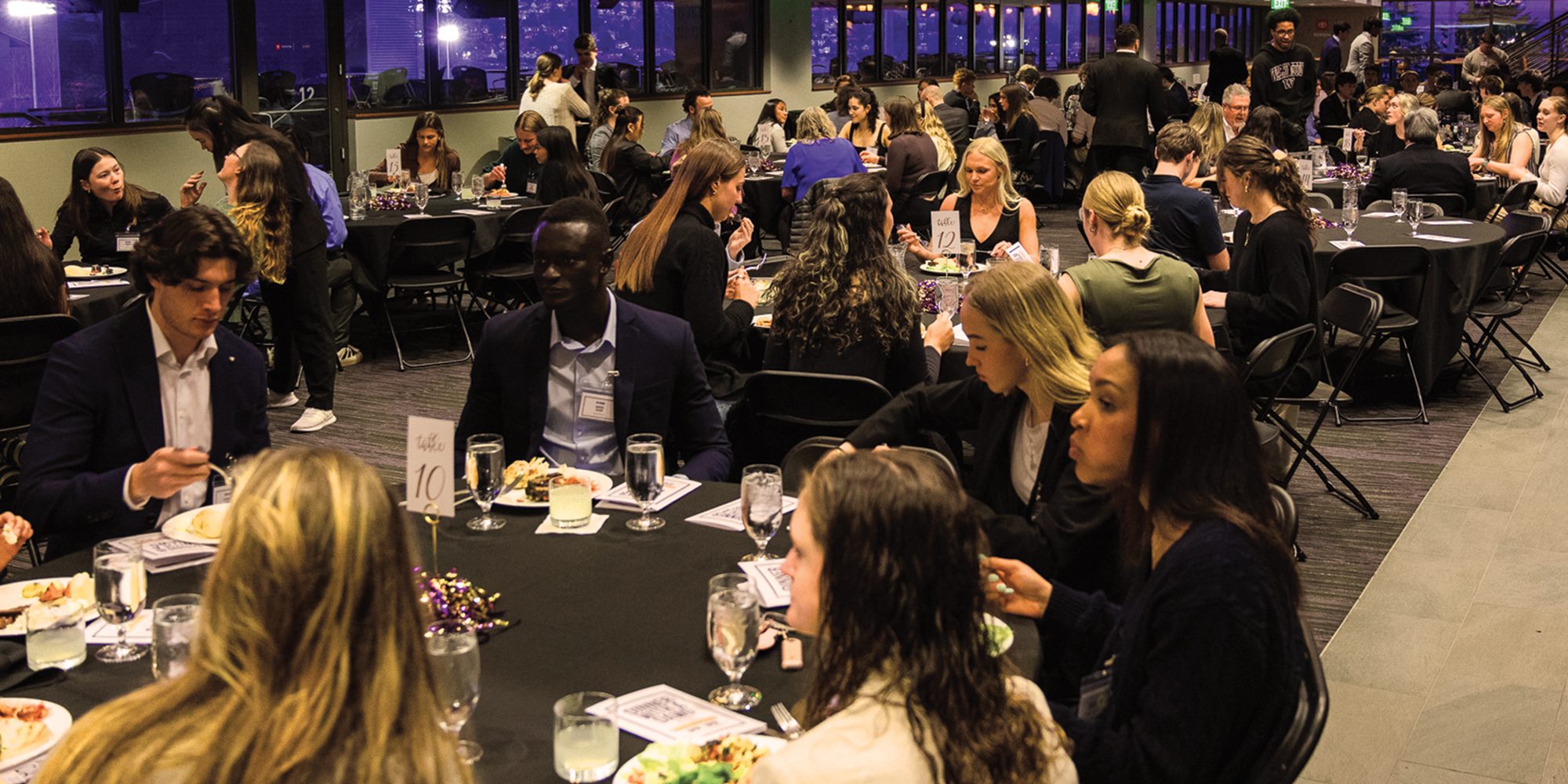Student-athletes and professionals at Dinner with a Dawg