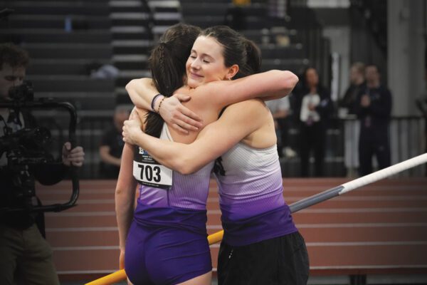 Amanda and Hana Moll hug after competing