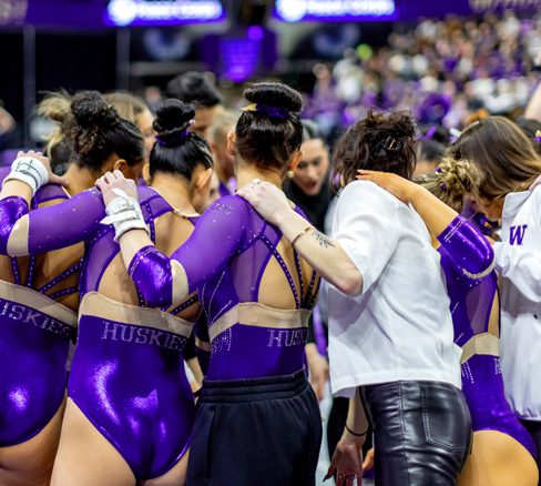 Gymnastics team huddle