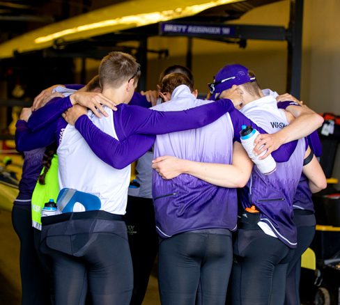 Men's Rowing huddle