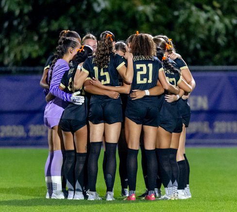 Women's Soccer team huddle