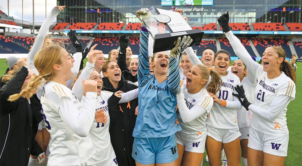 Women's Soccer team hoists Big Ten Championship trophy after winning on penalty kicks