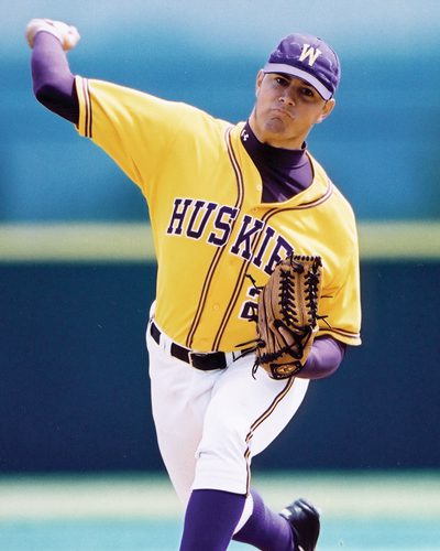 Greg Colburn throws a pitch